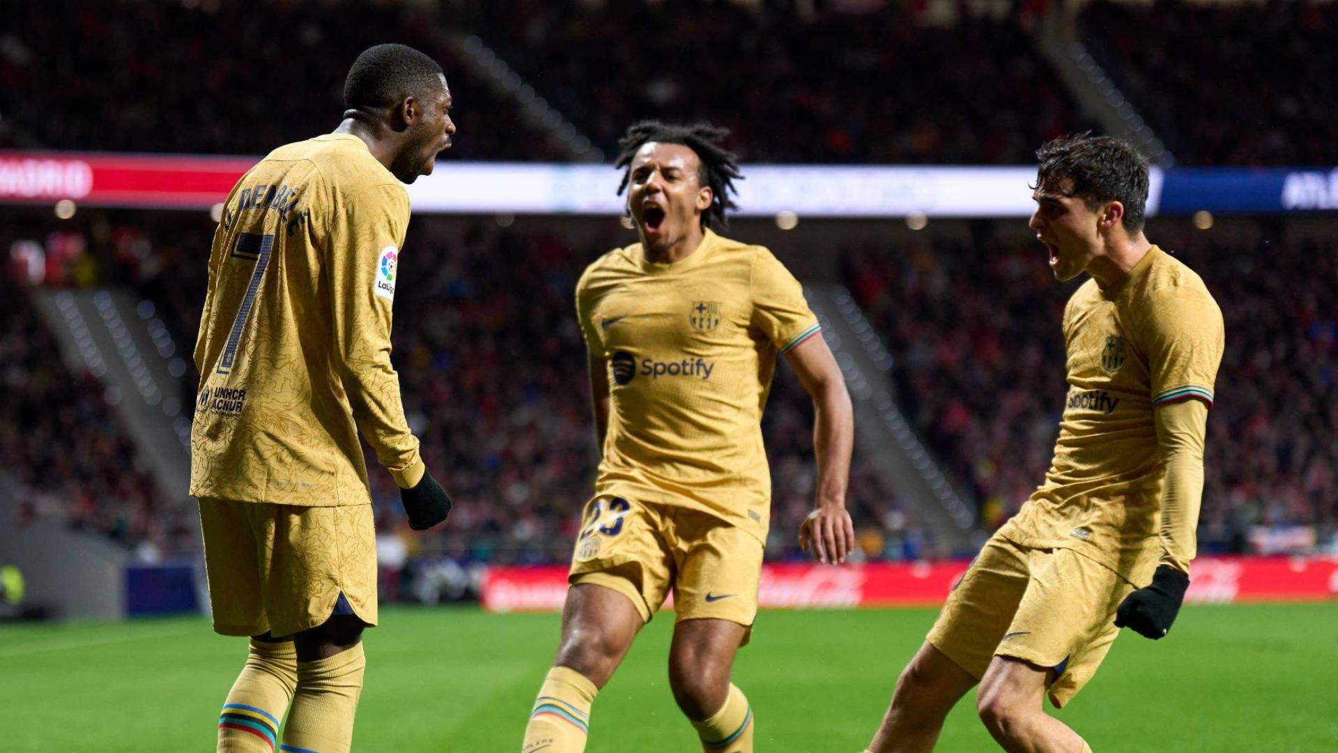 Barcelona players PedrI, Dembele and Kounde celebrating a goal