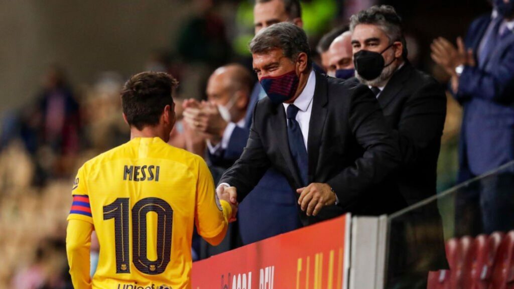 Barcelona president Laporta with Messi