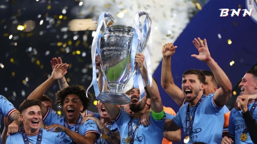 Barcelona midfield target Ilkay Gundogan lifting UCL trophy with Man City team mates