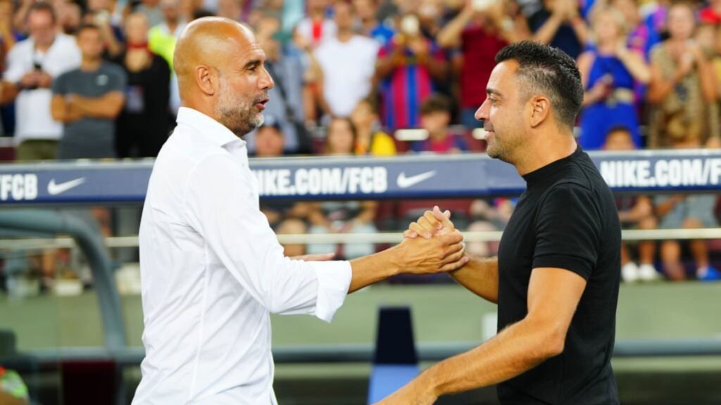 Xavi with Pep