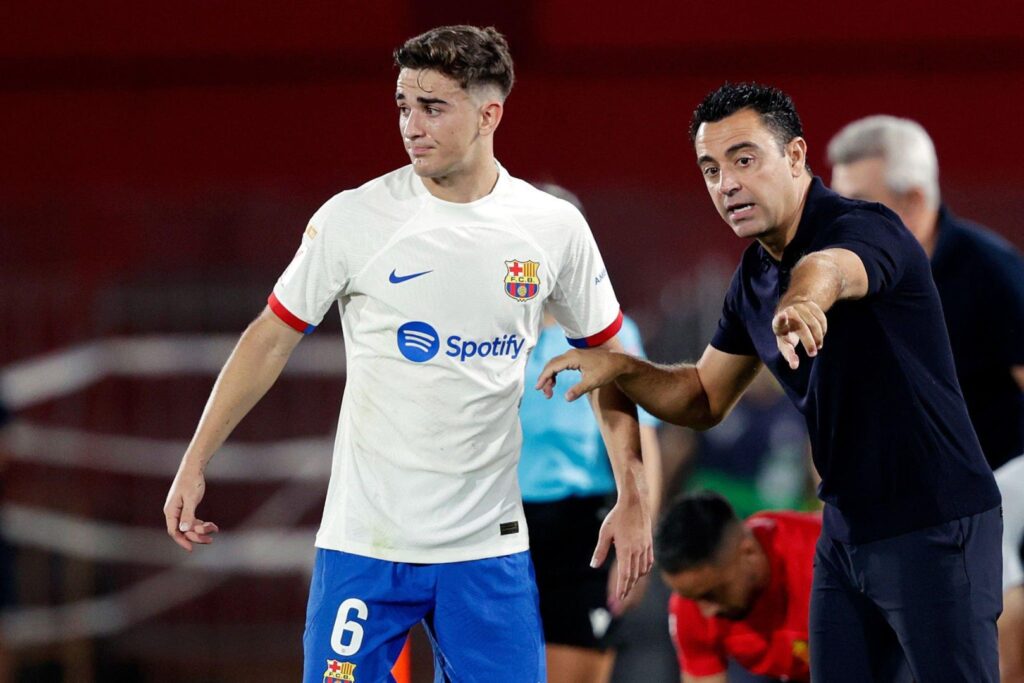 Barcelona youngster Gavi with Xavi