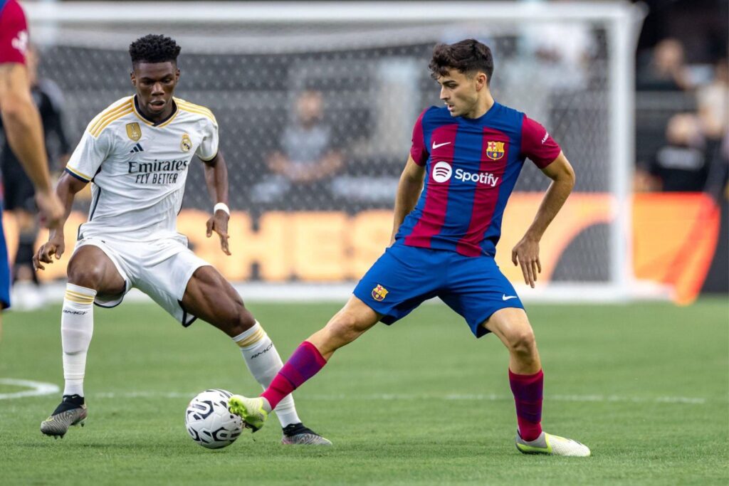 Pedri of Barcelona vs Aurelien Tchouameni of Real Madrid during USA Clasico