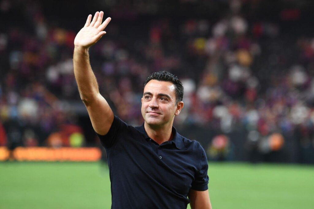 LAS VEGAS, NEVADA - AUGUST 01: Manager Xavier "Xavi" Hernández Creus of FC Barcelona waves to fans after of a preseason friendly match against AC Milan during the 2023 Soccer Champions Tour at Allegiant Stadium on August 01, 2023 in Las Vegas, Nevada.