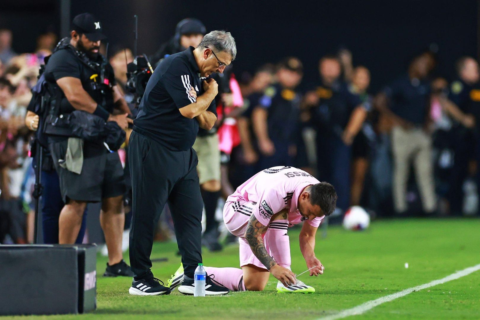 Barcelona legend Leo Messi and former Barcelona coach Gerardo Martino