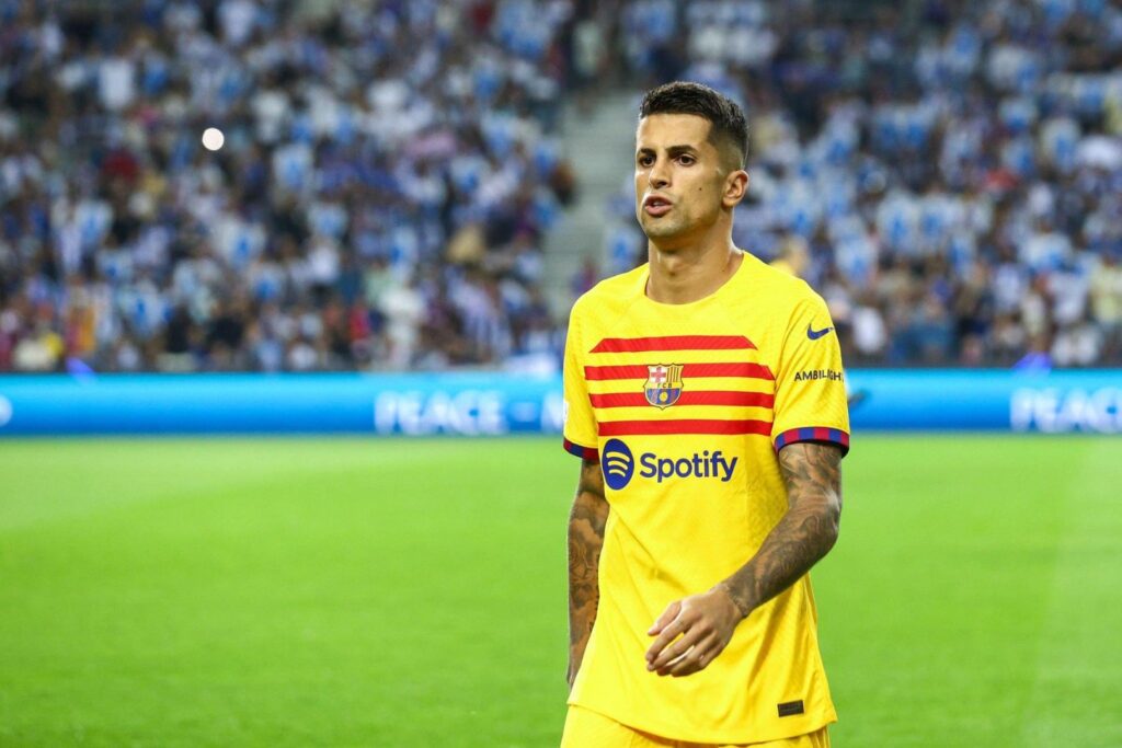 PORTO, PORTUGAL - OCTOBER 4: Joao Cancelo of FC Barcelona during the UEFA Champions League Group H match between FC Porto and FC Barcelona at Estadio do Dragao on October 4, 2023 in Porto, Portugal.