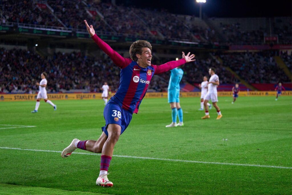 BARCELONA, SPAIN - OCTOBER 22: Marc Guiu of FC Barcelona celebrates after scoring his team's opening goal during the LaLiga EA Sports match between FC Barcelona and Athletic Bilbao at Estadi Olimpic Lluis Companys on October 22, 2023 in Barcelona, Spain.