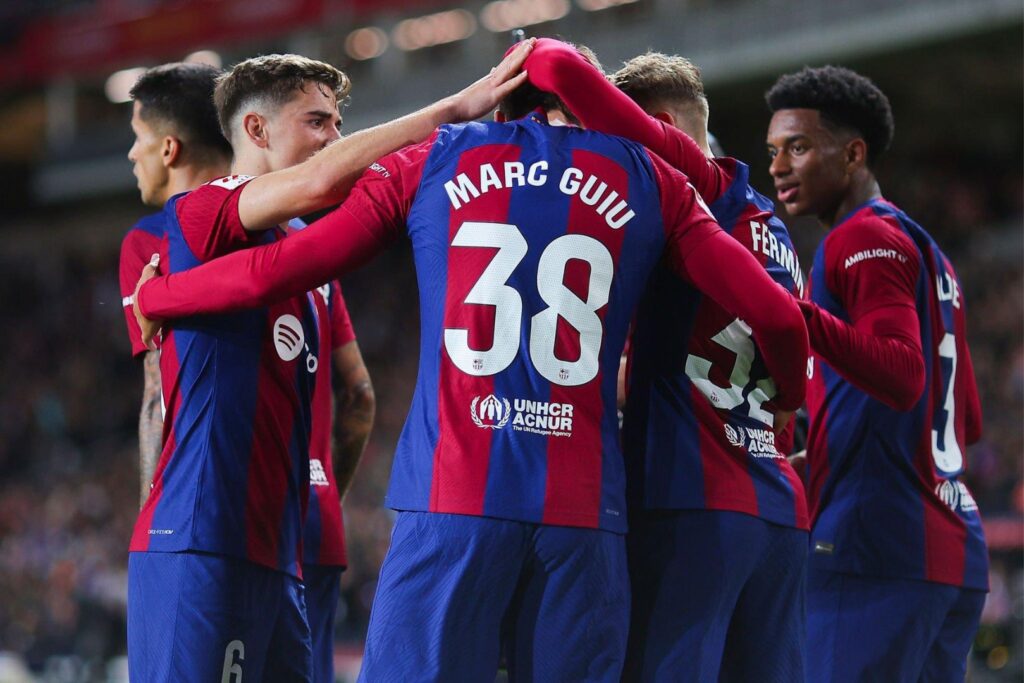 BARCELONA, SPAIN - OCTOBER 22: Marc Guiu of FC Barcelona celebrates with his teammates after scoring the team's first goal during the LaLiga EA Sports match between FC Barcelona and Athletic Bilbao at Estadi Olimpic Lluis Companys on October 22, 2023 in Barcelona, Spain.