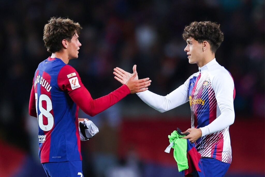 BARCELONA, SPAIN - OCTOBER 22: Marc Guiu of FC Barcelona is congratulated by Unai Hernandez after the team's victory in the LaLiga EA Sports match between FC Barcelona and Athletic Bilbao at Estadi Olimpic Lluis Companys on October 22, 2023 in Barcelona, Spain.