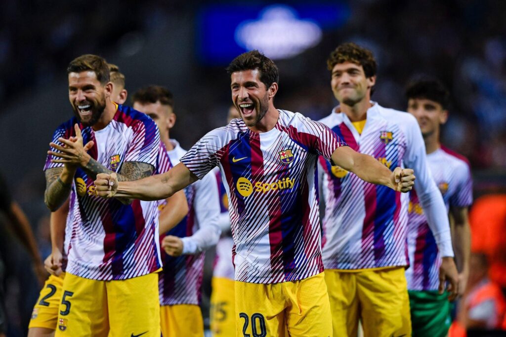 PORTO, PORTUGAL - OCTOBER 4: Sergi Roberto of Barcelona (C) and teammates celebrates Ferran Torres goal's during the UEFA Champions League Group Stage Group H match between FC Porto and FC Barcelona at Estadio do Dragao on October 4, 2023 in Porto, Portugal.