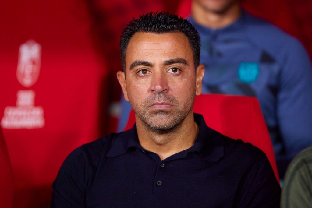 GRANADA, SPAIN - OCTOBER 08: Xavi Hernandez, manager of FC Barcelona looks on during the LaLiga EA Sports match between Granada CF and FC Barcelona at Estadio Nuevo Los Carmenes on October 08, 2023 in Granada, Spain.