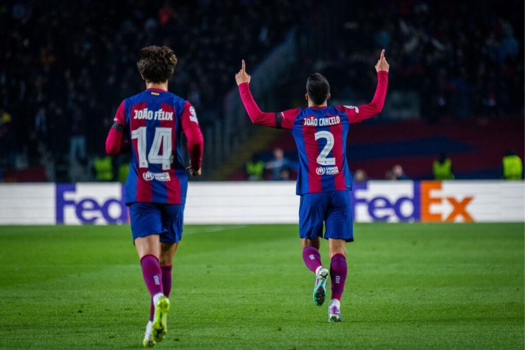 BARCELONA, SPAIN - NOVEMBER 28: Joao Cancelo of FC Barcelona celebrates a goal during the UEFA Champions League, Group H, football match played between FC Barcelona and FC Porto at Olympic de Montjuic stadium on November 28, 2023, in Barcelona, Spain.