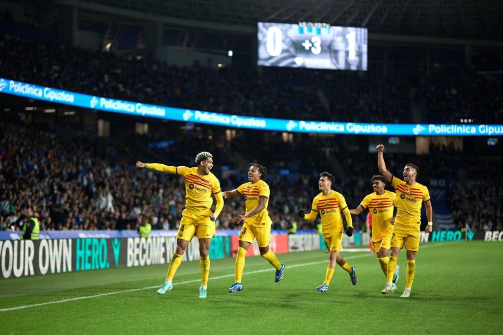 SAN SEBASTIAN, SPAIN - NOVEMBER 04: Ronald Araujo of FC Barcelona celebrates after scoring his team's first goal during the LaLiga EA Sports match between Real Sociedad and FC Barcelona at Reale Arena on November 04, 2023 in San Sebastian, Spain.