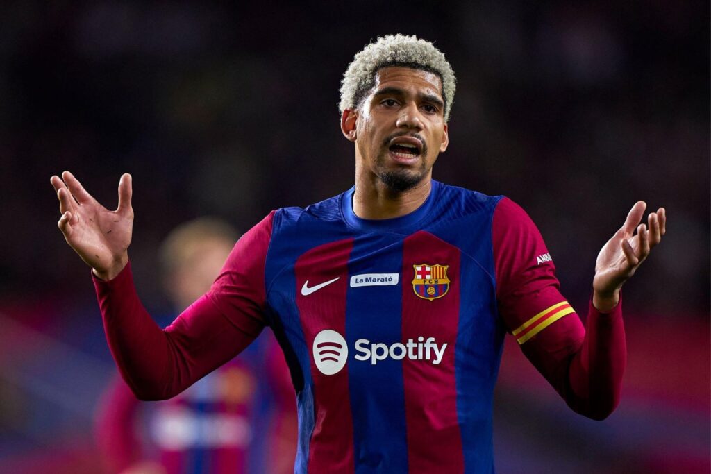 BARCELONA, SPAIN - DECEMBER 10: Ronald Araujo of FC Barcelona reacts during the LaLiga EA Sports match between FC Barcelona and Girona FC at Estadi Olimpic Lluis Companys on December 10, 2023 in Barcelona, Spain.