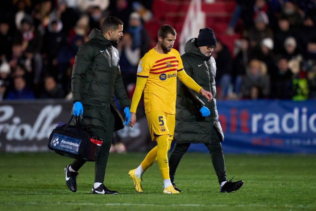 BARBASTRO, SPAIN - JANUARY 07: Inigo Martinez of FC Barcelona leaves the pitch with an injury during the Copa del Rey Round of 32 match between UD Barbastro and FC Barcelona at Campo Municipal de Deportes on January 07, 2024 in Barbastro, Spain.