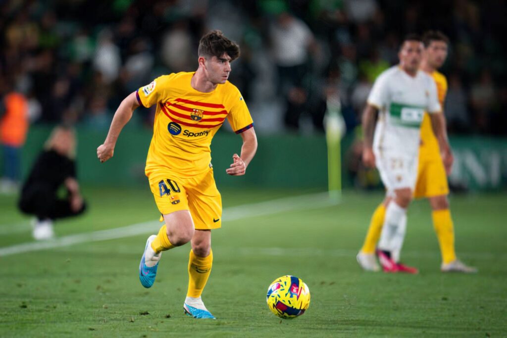 ELCHE, SPAIN - APRIL 01: Aleix Garrido of FC Barcelona run with the ball during the LaLiga Santander match between Elche CF and FC Barcelona at Estadio Manuel Martinez Valero on April 01, 2023 in Elche, Spain.