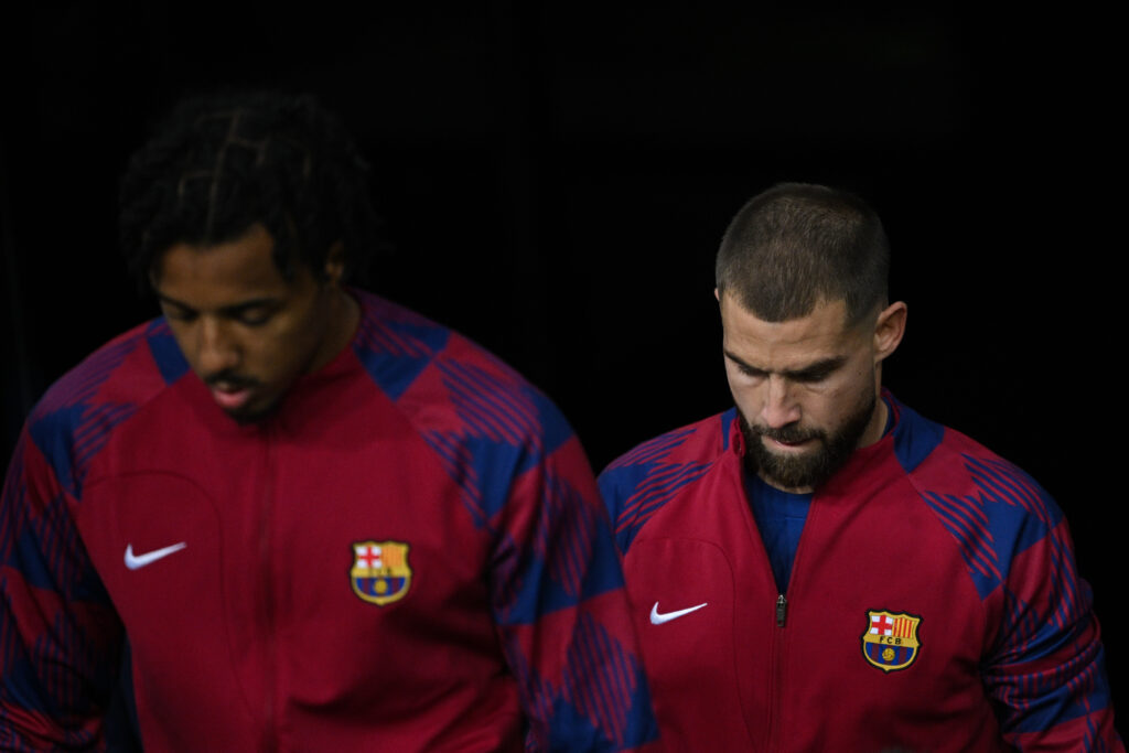 BARCELONA, SPAIN - NOVEMBER 28: Jules Kounde and Iñigo Martinez of FC Barcelona look on prior to the UEFA Champions League match between FC Barcelona and FC Porto at Estadi Olimpic Lluis Companys on November 28, 2023 in Barcelona, Spain.