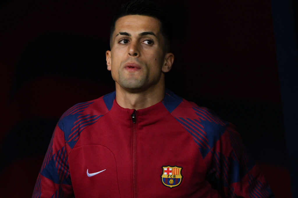 BARCELONA, SPAIN - DECEMBER 10: Joao Cancelo of FC Barcelona looks on prior to the LaLiga EA Sports match between FC Barcelona and Girona FC at Estadi Olimpic Lluis Companys on December 10, 2023 in Barcelona, Spain.