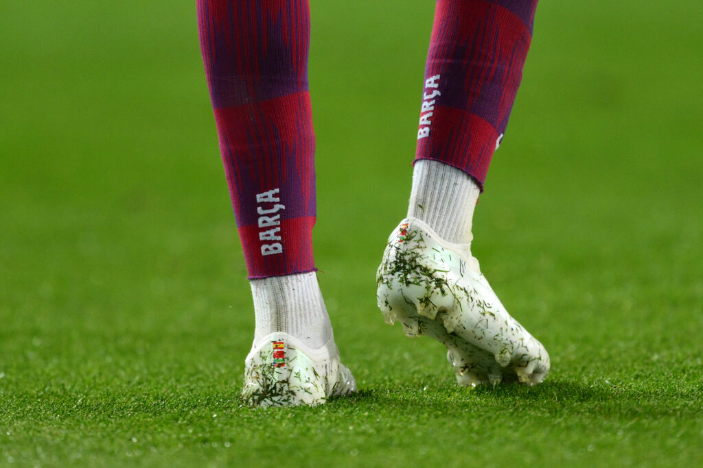 BARCELONA, SPAIN - JANUARY 27: A detailed view of the football boots of Lamine Yamal of FC Barcelona, see during the LaLiga EA Sports match between FC Barcelona and Villarreal CF at Estadi Olimpic Lluis Companys on January 27, 2024 in Barcelona, Spain.