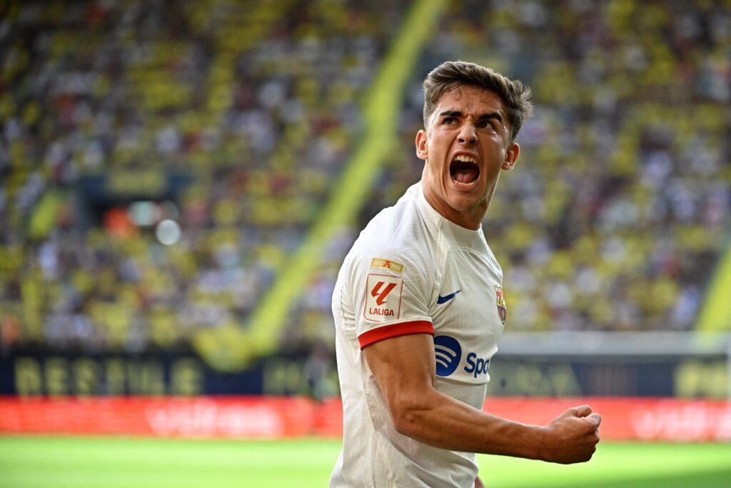 Barcelona's Spanish midfielder #06 Gavi celebrates scoring his team's first goal during the Spanish Liga football match between Villarreal CF and FC Barcelona at La Ceramica stadium in Vila-real on August 27, 2023.