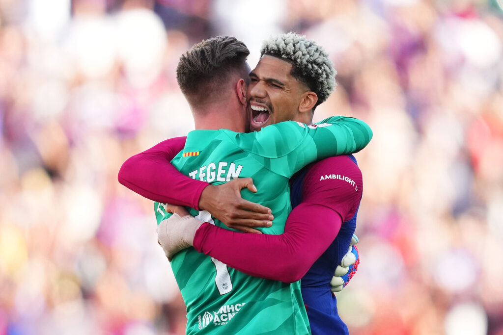 BARCELONA, SPAIN - OCTOBER 28: Marc-Andre ter Stegen and Ronald Araujo of FC Barcelona celebrate as Ilkay Guendogan of FC Barcelona scores the team's first goal during the LaLiga EA Sports match between FC Barcelona and Real Madrid CF at Estadi Olimpic Lluis Companys on October 28, 2023 in Barcelona, Spain.