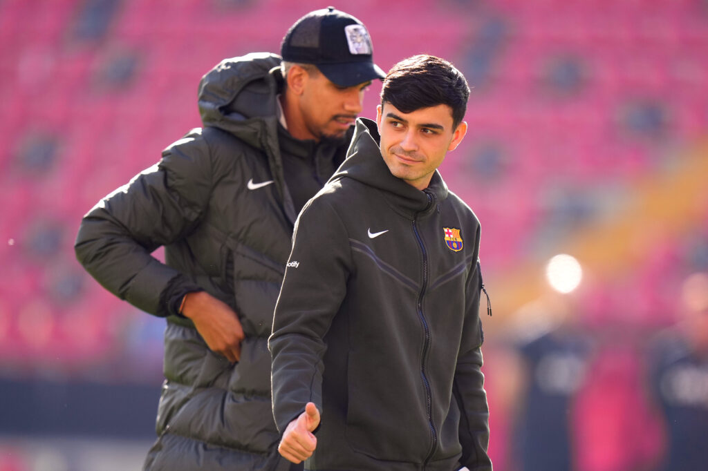 MADRID, SPAIN - NOVEMBER 25: Pedri of FC Barcelona inspects the pitch prior to the LaLiga EA Sports match between Rayo Vallecano and FC Barcelona at Estadio de Vallecas on November 25, 2023 in Madrid, Spain.