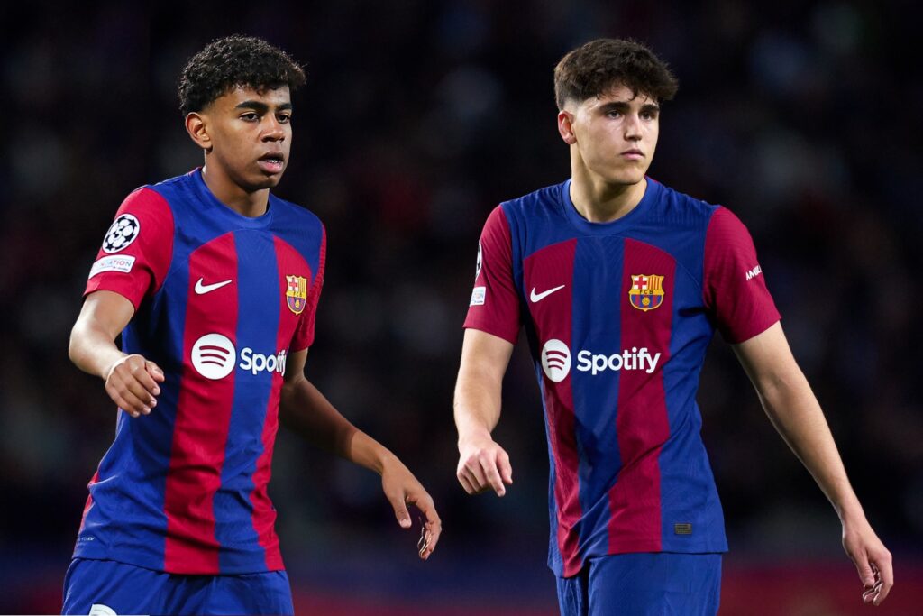 BARCELONA, SPAIN - MARCH 12: Lamine Yamal and Pau Cubarsi of FC Barcelona follows the action during the UEFA Champions League 2023/24 round of 16 second leg match between FC Barcelona and SSC Napoli at Estadi Olimpic Lluis Companys on March 12, 2024 in Barcelona, Spain.