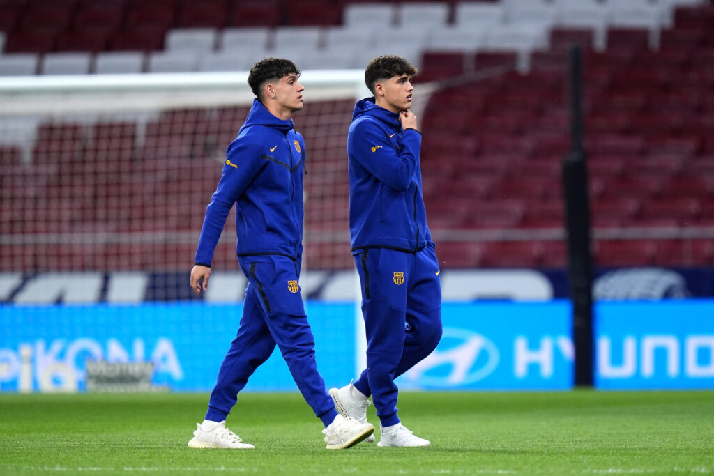 MADRID, SPAIN - MARCH 17: Hector Fort and Pau Cubarsi of FC Barcelona look on during a pitch inspection prior to the LaLiga EA Sports match between Atletico Madrid and FC Barcelona at Civitas Metropolitano Stadium on March 17, 2024 in Madrid, Spain.