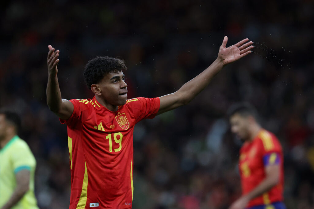 Spain's forward #19 Lamine Yamal reacts during the international friendly football match between Spain and Brazil at the Santiago Bernabeu stadium in Madrid, on March 26, 2024. Spain arranged a friendly against Brazil at the Santiago Bernabeu under the slogan "One Skin" to help combat racism.