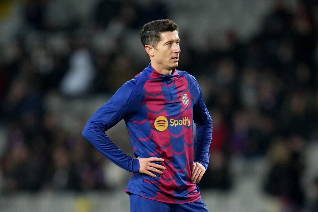 BARCELONA, SPAIN - JANUARY 31: Robert Lewandowski of FC Barcelona looks on during the team warm up prior to the LaLiga EA Sports match between FC Barcelona and CA Osasuna at Estadi Olimpic Lluis Companys on January 31, 2024 in Barcelona, Spain.