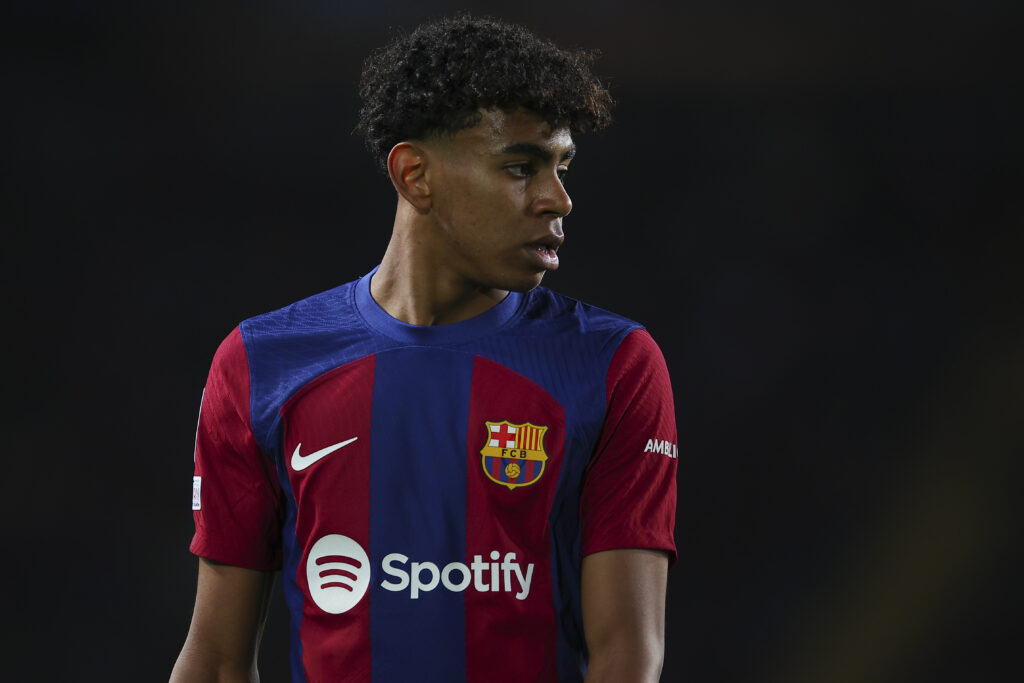 BARCELONA, SPAIN - MARCH 12: Lamine Yamal of FC Barcelona looks on during the UEFA Champions League 2023/24 round of 16 second leg match between FC Barcelona and SSC Napoli at Estadi Olimpic Lluis Companys on March 12, 2024 in Barcelona, Spain.