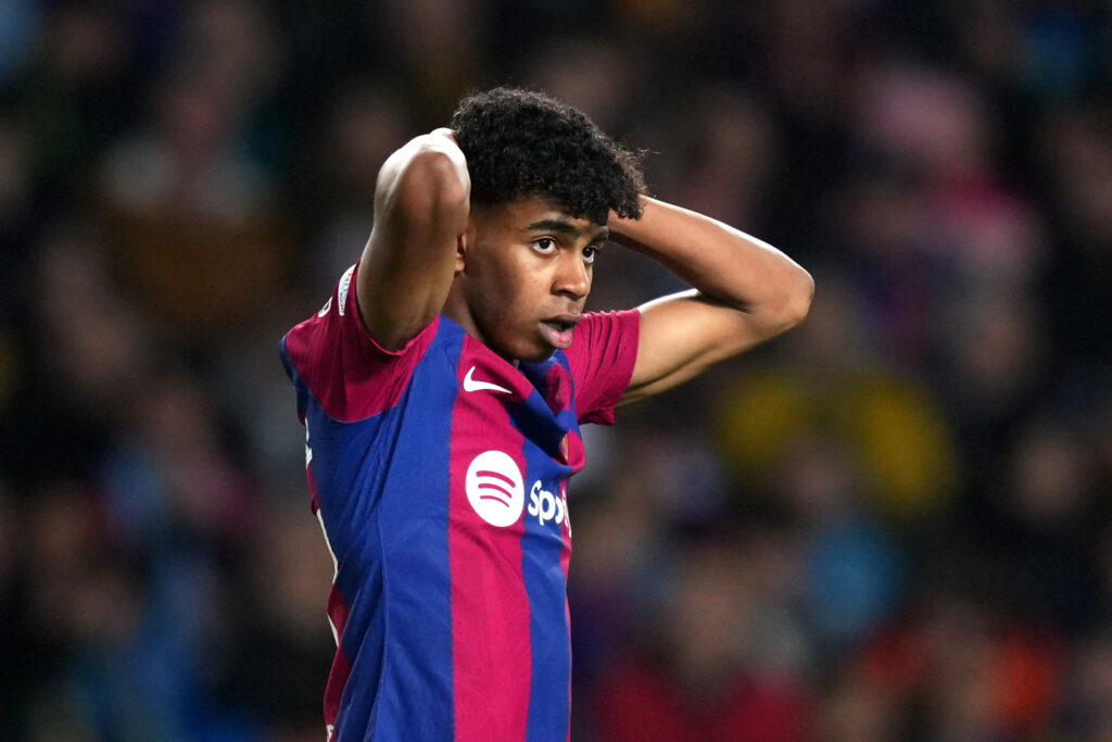 BARCELONA, SPAIN - MARCH 12: Lamine Yamal of FC Barcelona reacts after a missed chance during the UEFA Champions League 2023/24 round of 16 second leg match between FC Barcelona and SSC Napoli at Estadi Olimpic Lluis Companys on March 12, 2024 in Barcelona, Spain.