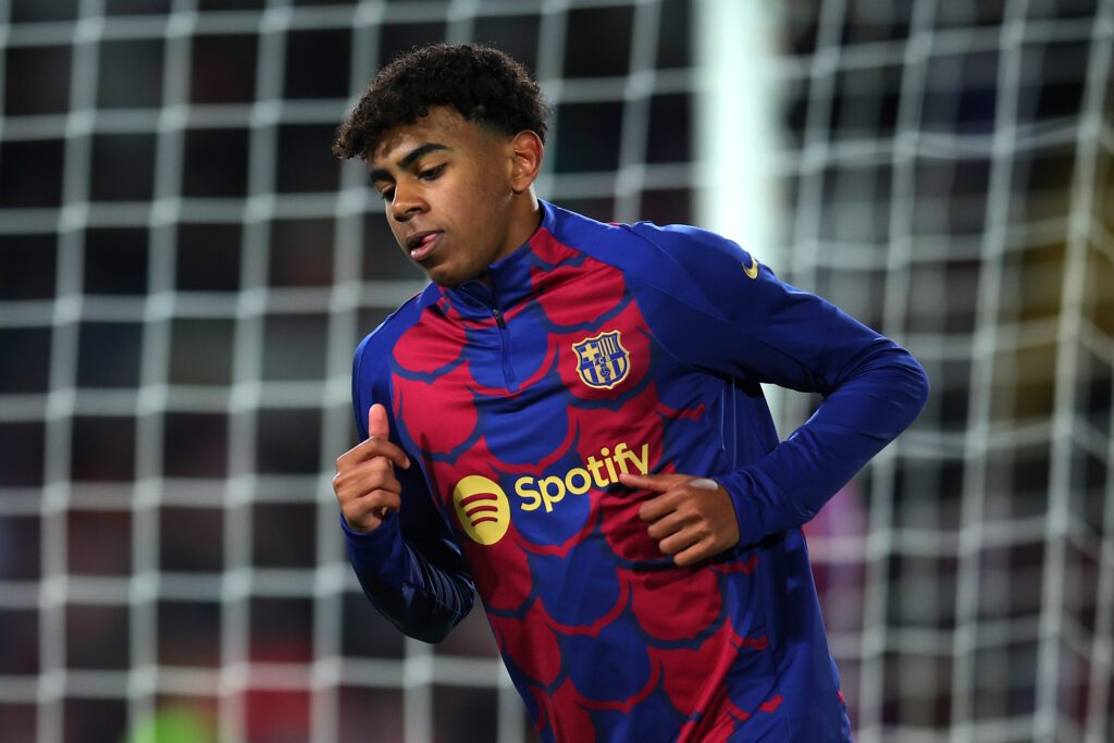 BARCELONA, SPAIN - MARCH 12: Lamine Yamal of FC Barcelona warms up prior to the UEFA Champions League 2023/24 round of 16 second leg match between FC Barcelona and SSC Napoli at Estadi Olimpic Lluis Companys on March 12, 2024 in Barcelona, Spain.