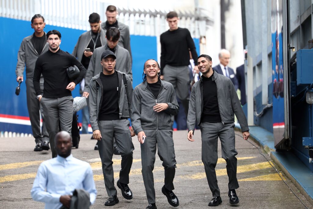 (From L) Paris Saint-Germain's French forward #07 Kylian Mbappe, his brother Paris Saint-Germain's midfielder #38 Ethan Mbappe and Paris Saint-Germain's Moroccan defender #02 Achraf Hakimi arrive ahead of the French L1 football match between Paris Saint-Germain (PSG) and Clermont Foot 63 at the Parc des Princes stadium in Paris on April 6, 2024.