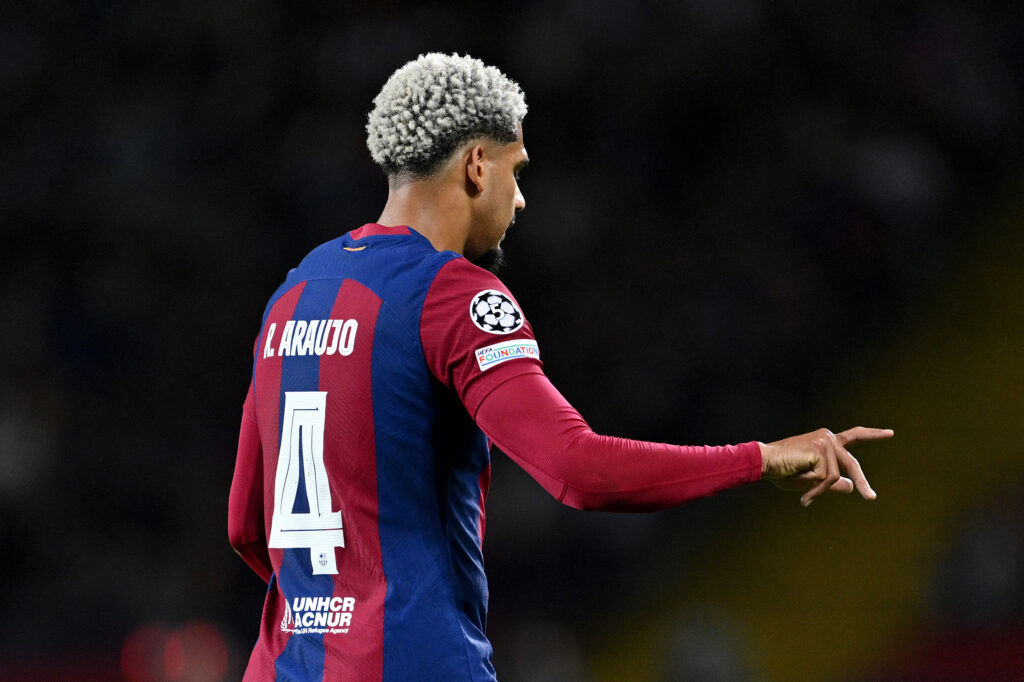 BARCELONA, SPAIN - APRIL 16: Ronald Araujo of FC Barcelona gestures as he leaves the pitch after being shown a red card by Referee Istvan Kovacs (not pictured) for a foul on Bradley Barcola of Paris Saint-Germain (not pictured) during the UEFA Champions League quarter-final second leg match between FC Barcelona and Paris Saint-Germain at Estadi Olimpic Lluis Companys on April 16, 2024 in Barcelona, Spain.