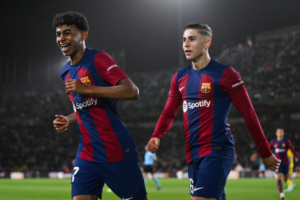 BARCELONA, SPAIN - MARCH 30: Raphinha of FC Barcelona (Not in Picture) celebrates with his team mates Fermin Lopez and Lamine Yamal of FC Barcelona scoring a goal which was later ruled out for offside during the LaLiga EA Sports match between FC Barcelona and UD Las Palmas at Estadi Olimpic Lluis Companys on March 30, 2024 in Barcelona, Spain.