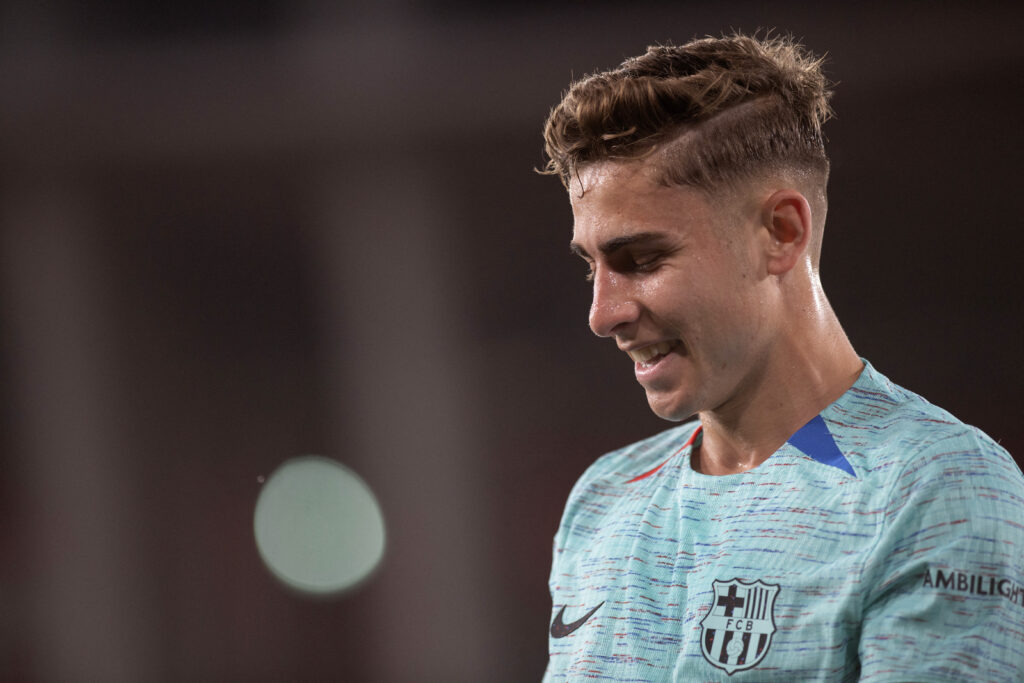 Barcelona's Spanish midfielder #16 Fermin Lopez celebrates scoring the opening goal during the Spanish league football match between UD Almeria and FC Barcelona at the Municipal Stadium of the Mediterranean Games in Almeria on May 16, 2024.