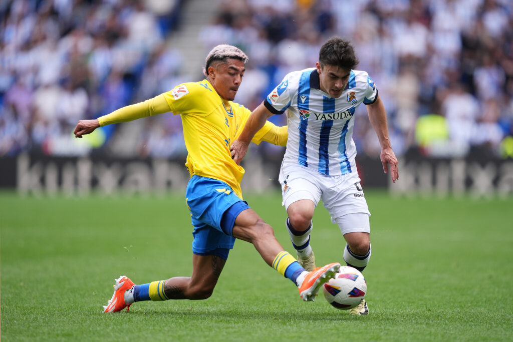 SAN SEBASTIAN, SPAIN - MAY 04: Julian Araujo of UD Las Palmas challenges Ander Barrenetxea of Real Sociedad during the LaLiga EA Sports match between Real Sociedad and UD Las Palmas at Reale Arena on May 04, 2024 in San Sebastian, Spain.