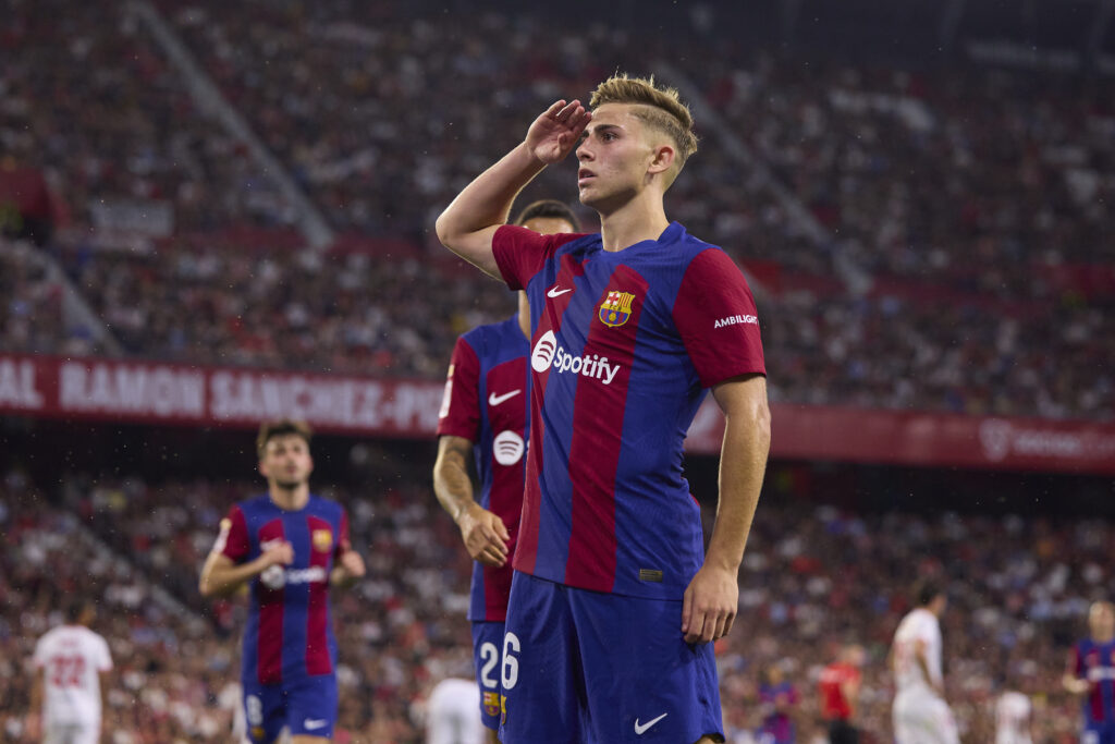 SEVILLE, SPAIN - MAY 26: Fermin Lopez of FC Barcelona celebrates after scoring the teams second goal during the LaLiga EA Sports match between Sevilla FC and FC Barcelona at Estadio Ramon Sanchez Pizjuan on May 26, 2024 in Seville, Spain.