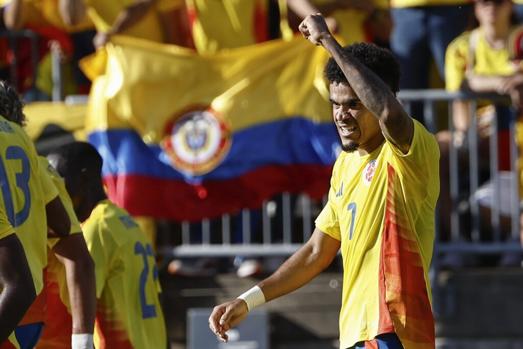 EAST HARTFORD, CT - JUNE 15: Luis Diaz #7 of Colombia raises his fist after scoring against Bolivia during the first half of their international friendly match at Pratt & Whitney Stadium on June 15, 2024 in Hartford, Connecticut.