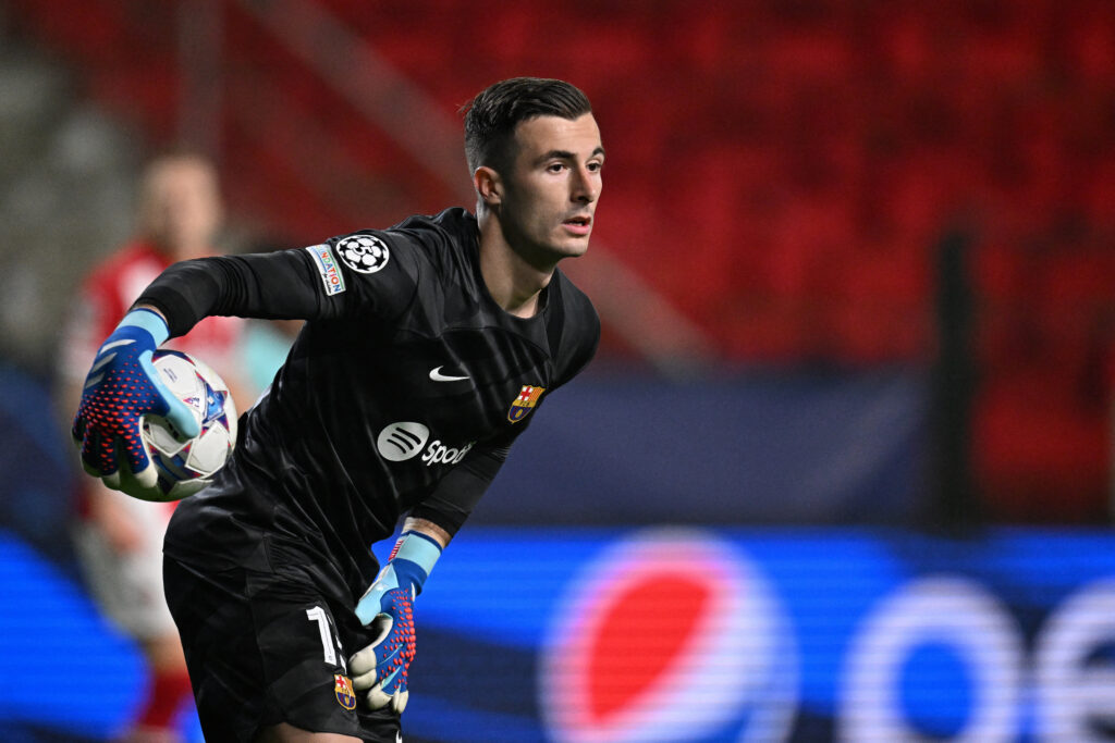 Barcelona's Spanish goalkeeper #13 Inaki Pena holds the ball during the UEFA Champions League Group H football match between Royal Antwerp FC and FC Barcelona at the Bosuilstadion in Antwerp, on December 13, 2023.