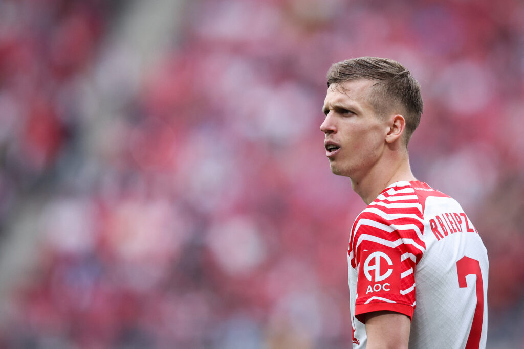 Leipzig's Spanish forward #07 Dani Olmo reacts during the German first division Bundesliga football match RB Leipzig v 1. FSV Mainz 05 in Leipzig, eastern Germany on March 30, 2024.