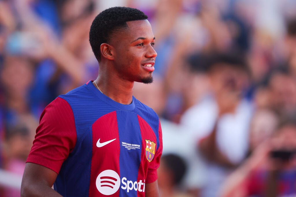 BARCELONA, SPAIN - AUGUST 08: Ansu Fati of FC Barcelona waves the supporters during the presentation prior to the Joan Gamper Trophy match between FC Barcelona and Tottenham Hotspur at Estadi Olimpic Lluis Companys on August 08, 2023 in Barcelona, Spain.