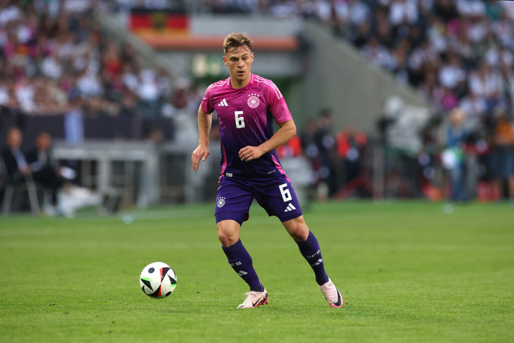 MOENCHENGLADBACH, GERMANY - JUNE 07: Joshua Kimmich of Germany runs with the ball during the international friendly match between Germany and Greece at Borussia Park Stadium on June 07, 2024 in Moenchengladbach, Germany.