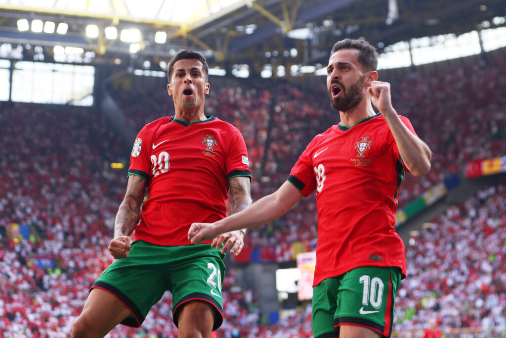 DORTMUND, GERMANY - JUNE 22: Bernardo Silva of Portugal celebrates scoring his team's first goal with teammate Joao Cancelo during the UEFA EURO 2024 group stage match between Turkiye and Portugal at Football Stadium Dortmund on June 22, 2024 in Dortmund, Germany.