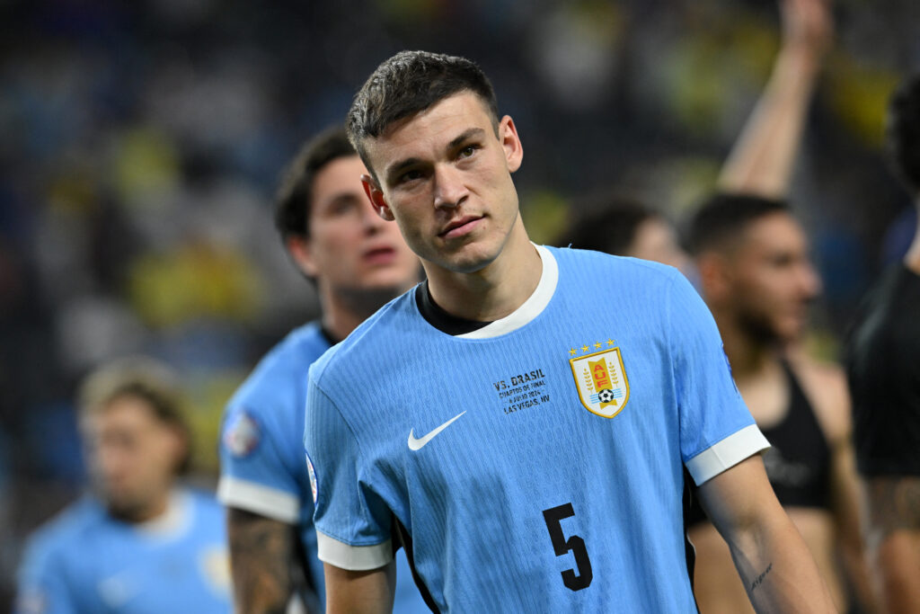 Uruguay's midfielder #05 Manuel Ugarte celebrates after scoring in a penalty shoot-out to win the Conmebol 2024 Copa America tournament quarterfinal football match between Uruguay and Brazil at Allegiant Stadium in Las Vegas, Nevada on July 6, 2024.