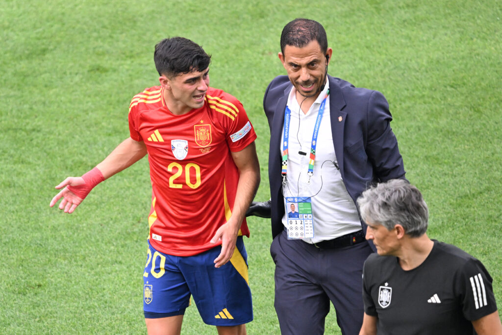 Spain's midfielder #20 Pedri reacts after being fouled during the UEFA Euro 2024 quarter-final football match between Spain and Germany at the Stuttgart Arena in Stuttgart on July 5, 2024.