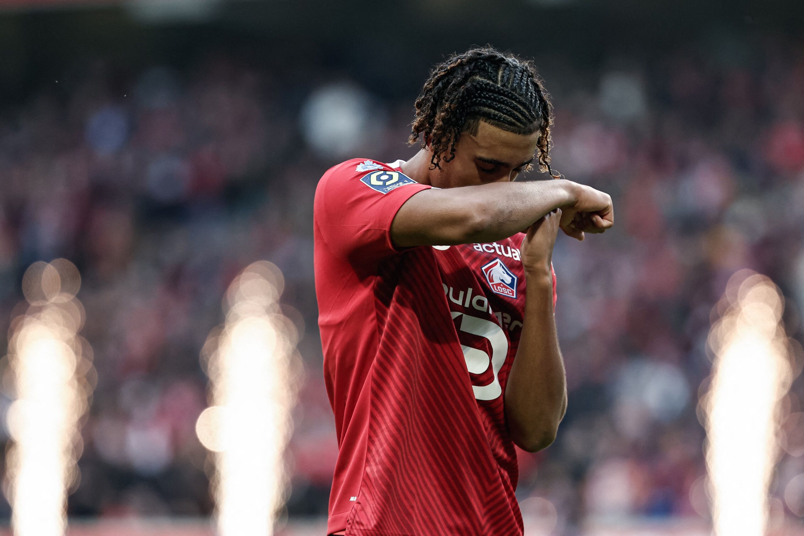 Lille's French defender #15 Leny Yoro celebrates after scoring his team's first goal during the French L1 football match between Lille OSC (LOSC) and Toulouse FC (TFC) at the Stade Pierre-Mauroy in Villeneuve-d'Ascq, northern France on November 12, 2023.