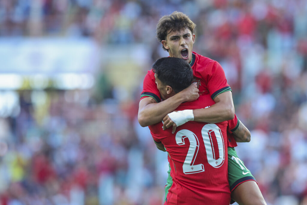 AVEIRO, PORTUGAL - JUNE 11: Joao Felix of Portugal celebrates scoring Portugal goal with Joao Cancelo of Portugal during the International Friendly match between Portugal and Republic of Ireland at Estadio Municipal de Aveiro on June 11, 2024 in Aveiro, Portugal.