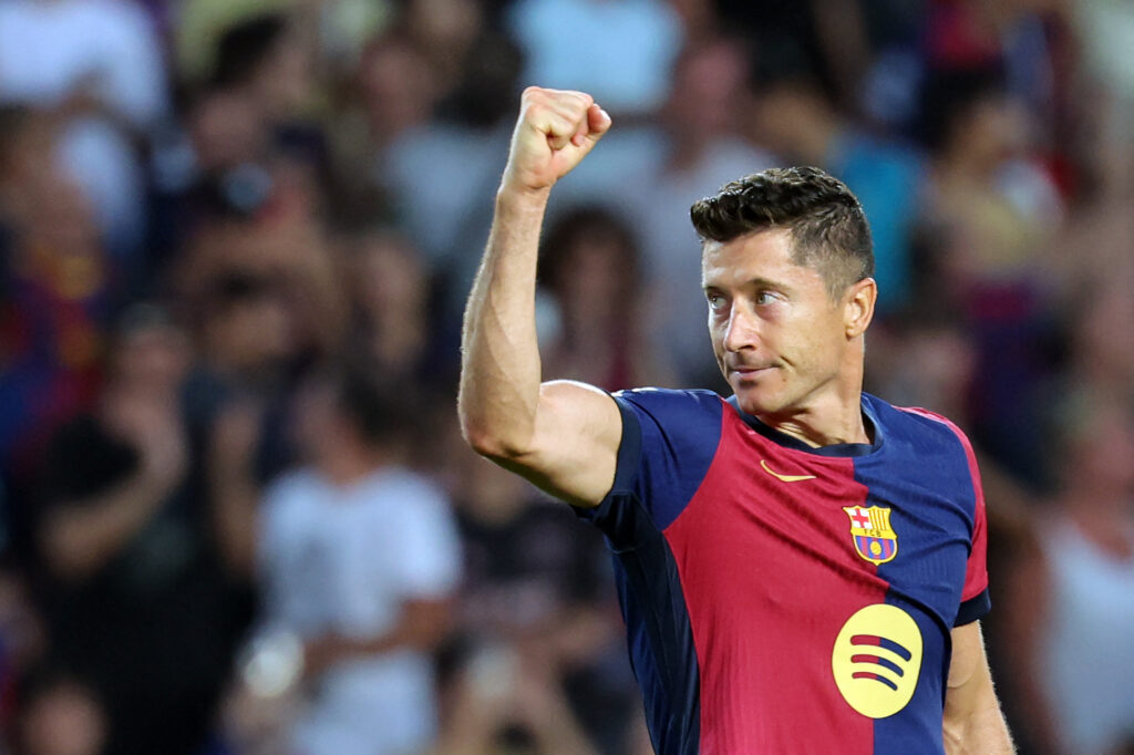 Barcelona's Polish forward #09 Robert Lewandowski celebrates scoring his team's second goal during the Spanish league football match between FC Barcelona and Athletic Club Bilbao at the Estadi Olimpic Lluis Companys in Barcelona on August 24, 2024.