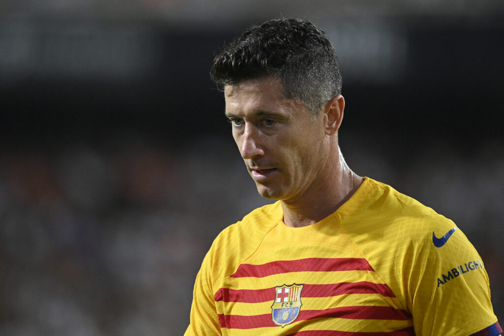 Barcelona's Polish forward #09 Robert Lewandowski leaves the pitch at the end of the Spanish league football match between Valencia CF and Barcelona at the Mestalla stadium in Valencia on August 17, 2024.